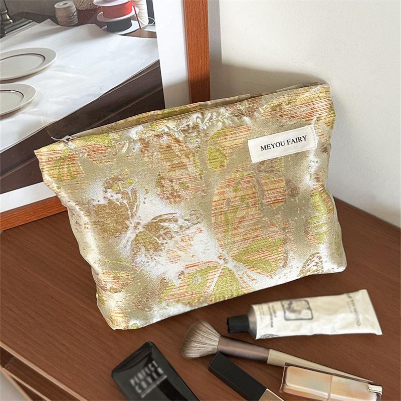 "Compact Fresh Cosmetic & Skincare Travel Bag - Portable Handheld Storage for Toiletries & Underwear"