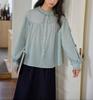 French fungus edge stand-up collar curved split long-sleeved green shirt women's lace-up top spring