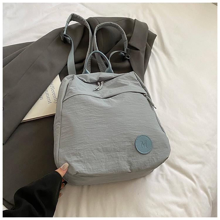 Large capacity bag new simple casual versatile backpack female college student schoolbag lightweight travel backpack