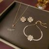 European & American Women's Zircon Flower Necklace & Rotatable Pendant Earrings Set