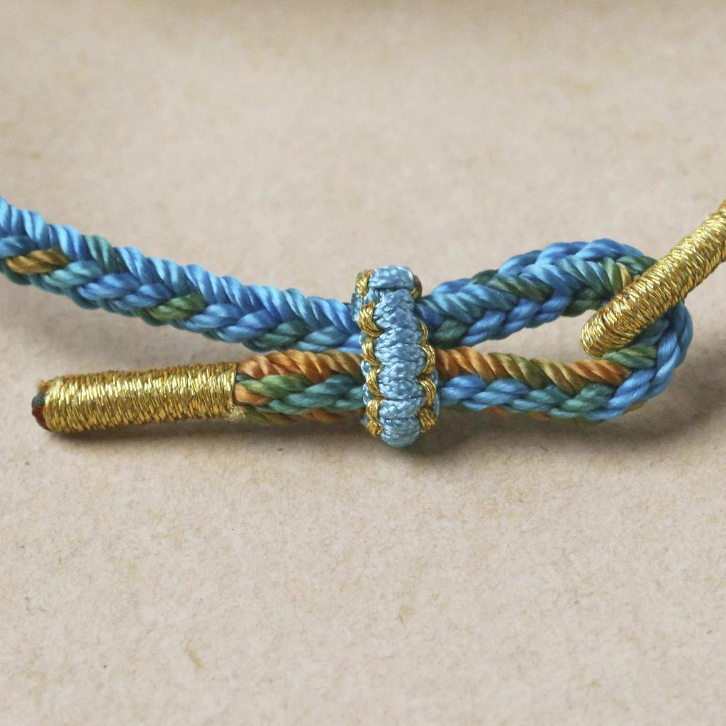 A Thousand Li of Rivers and Mountains 3D Gold Couple Bracelet with Large-Hole Rope in National Style.