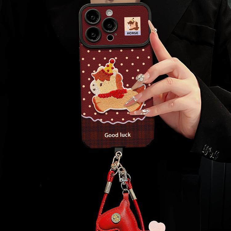 Embroidered pony lanyard suitable for Apple 17promax mobile phone case iphone15 silicone skin 16 New Year's women's models