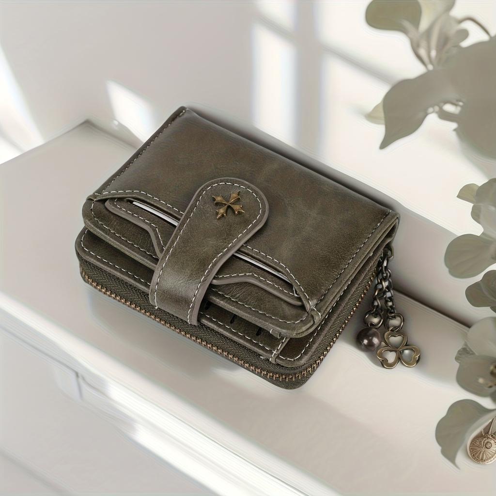 Damenkurzgeldbörse klassisch und retro im Stil. zeichnet sich durch ein schlichtes Design mit Hardware-Dekorationen aus und ist für den täglichen Gebrauch geeignet. mehrere Kartenfächer.