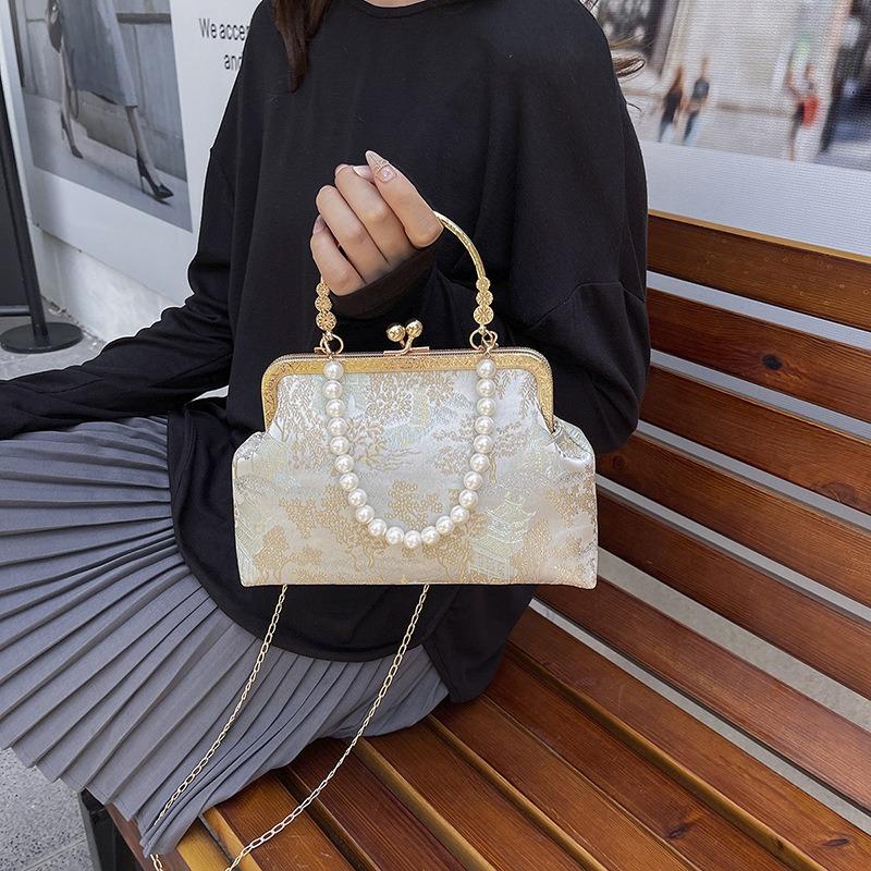 Embroidery bag women's new pearl chain messenger bag niche portable gold bag