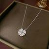 Women's Heart-Shaped Necklace with Four-Petal Flower, Cubic Zirconia, Titanium Steel Clavicle Chain - Elegant and Versatile Accessory