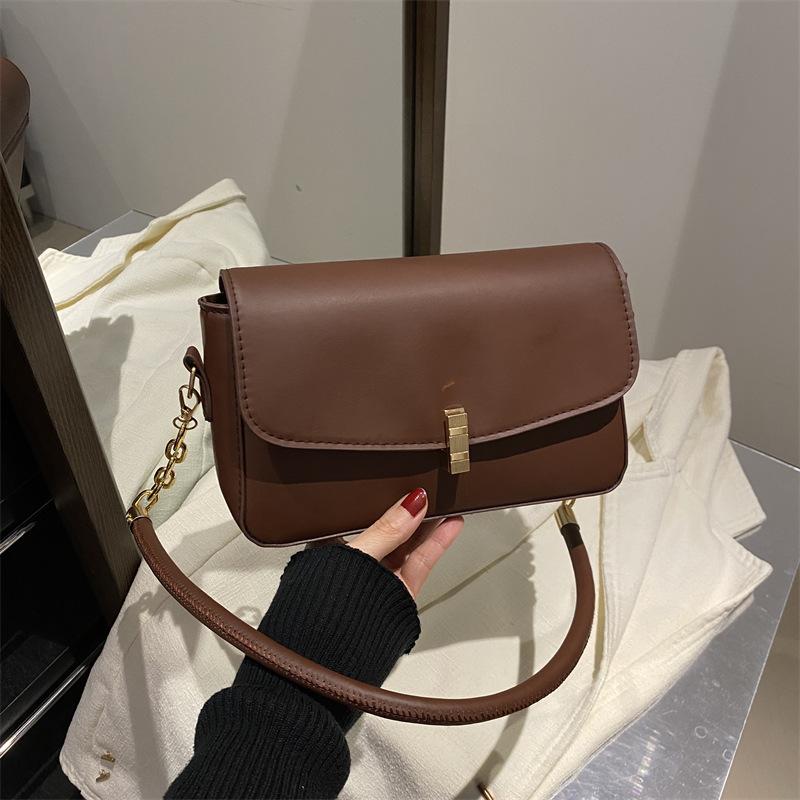 

Премиальная корейская версия новой повседневной универсальной сумки подмышку, женская модная нишевая однотонная сумка-мессенджер для通勤