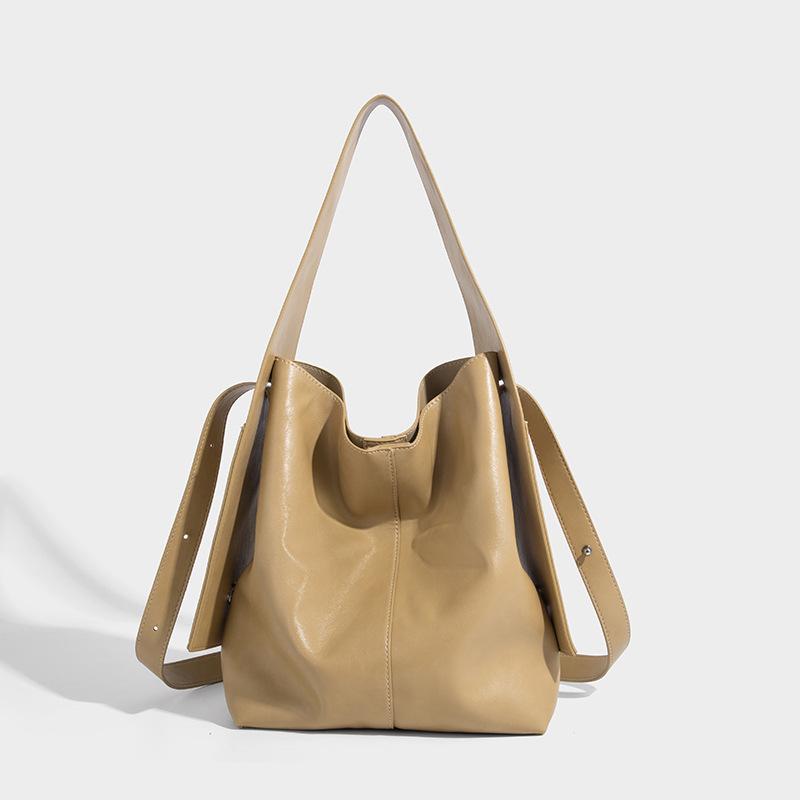 Large-capacity tote bag for women, Korean style, fashionable for work and commuting, shoulder bag, 2025 summer niche high-end underarm bag