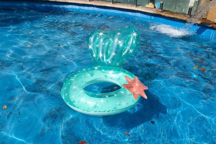 Kids' and adults' swim rings for girls and boys, perfect for summer, the beach, or the pool. Cute, sparkly, and colorful with handles. Safe for water