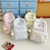 Schoolbag pastoral high school schoolbag female ins niche cartoon large capacity Korean backpack junior high school high value backpack