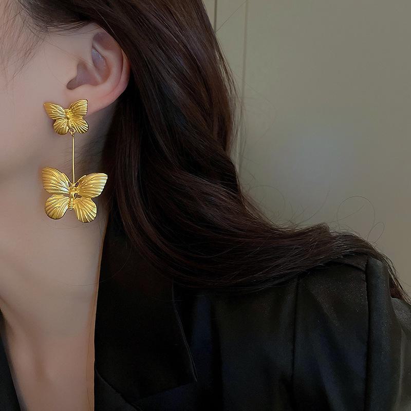 Náušnice se střapcem z dutých květů s postříbřenou jehlou a pozlacením - Evropský a americký niche design