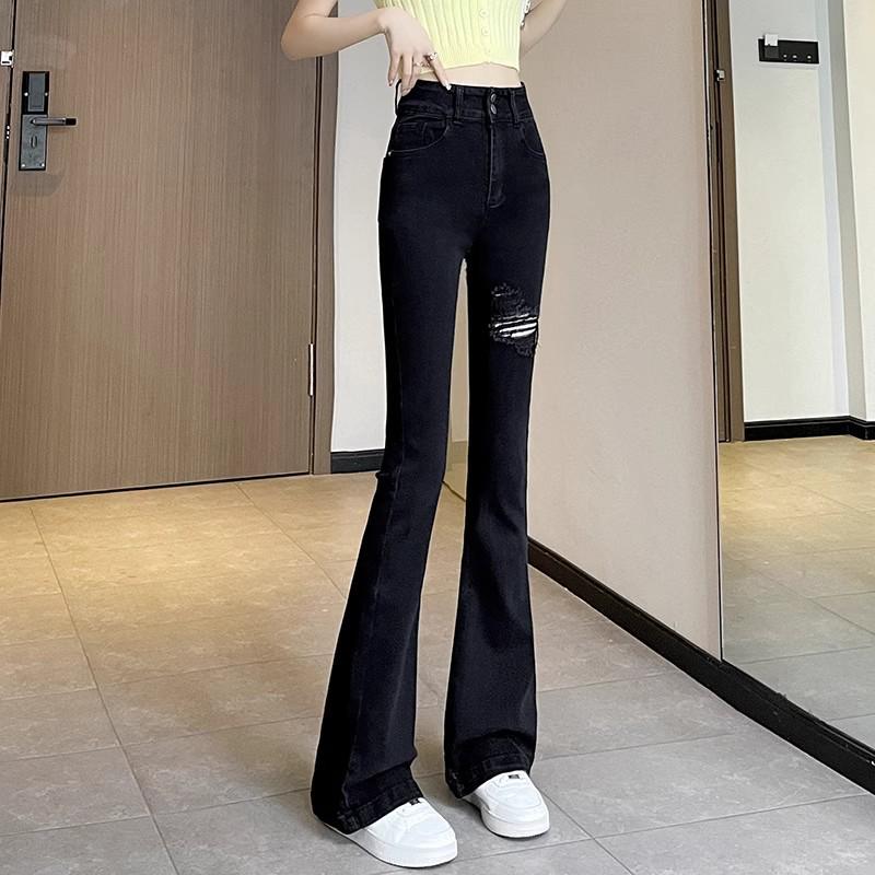 

Женские джинсы микро-клеш с рваными деталями в корейском стиле: Стройнящая талия, универсальные модные длинные брюки-швабра XS чёрный