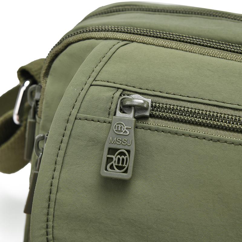 Kompaktní crossbody taška s více kapsami na zip pro muže a ženy