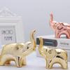 Elegant Ceramic Elephant Figurine As A Decorative Accent For Home And Office Spaces