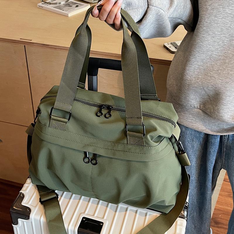 Japanese hand-held travel bags for men and women large-capacity short-distance travel cloth bags shoulder messenger bags fashion sports fitness bags