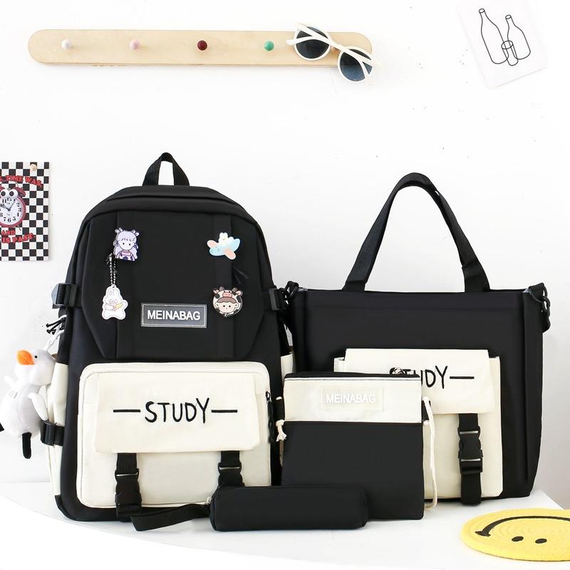 Schoolbag female new high school junior high school students large capacity backpack Japanese Korean version primary school students campus four-piece