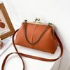 European & American Lychee Pattern Retro Shell Bag: 2026 Versatile Simple Shoulder & Chain Handbag for Women.