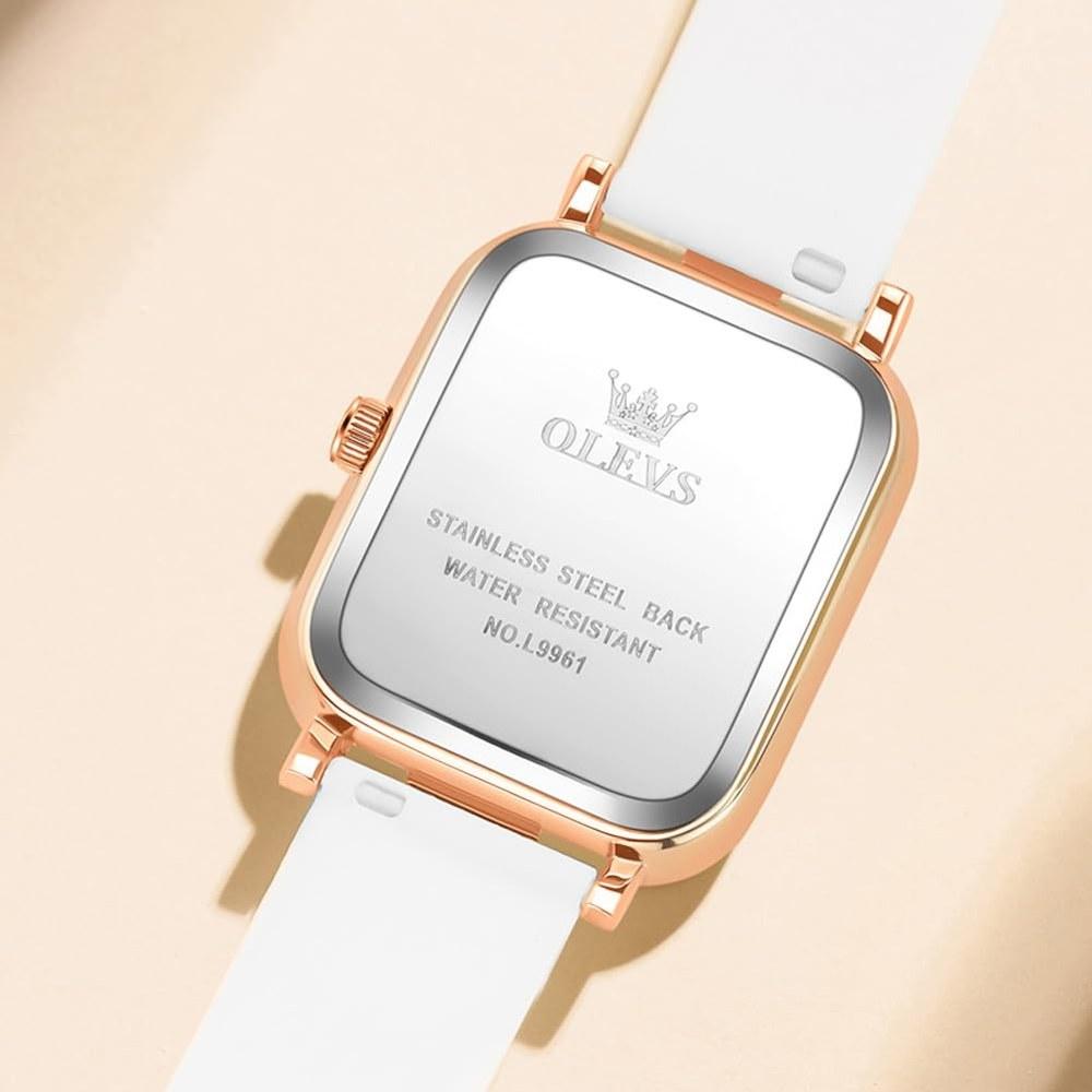 OLEVS Women's Waterproof Wristwatch Quartz Movement White Silicone Band Rose Gold Case Black Dial Luminous Function