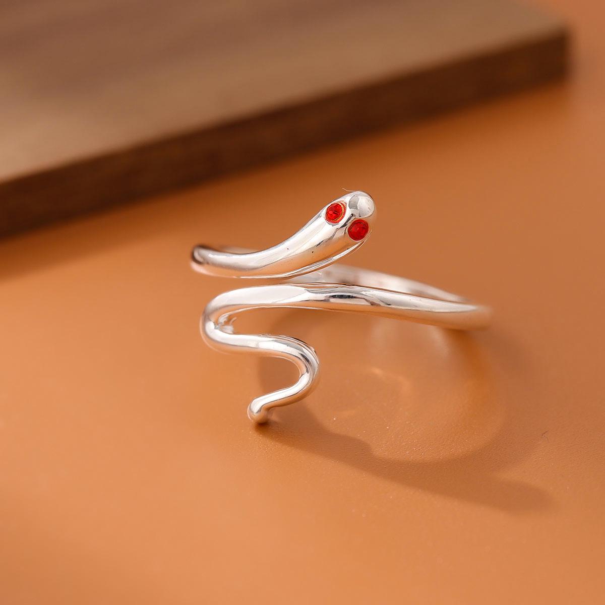 

Fashionable Red-Eyed Snake Ring with Diamond Accents Adjustable Opening