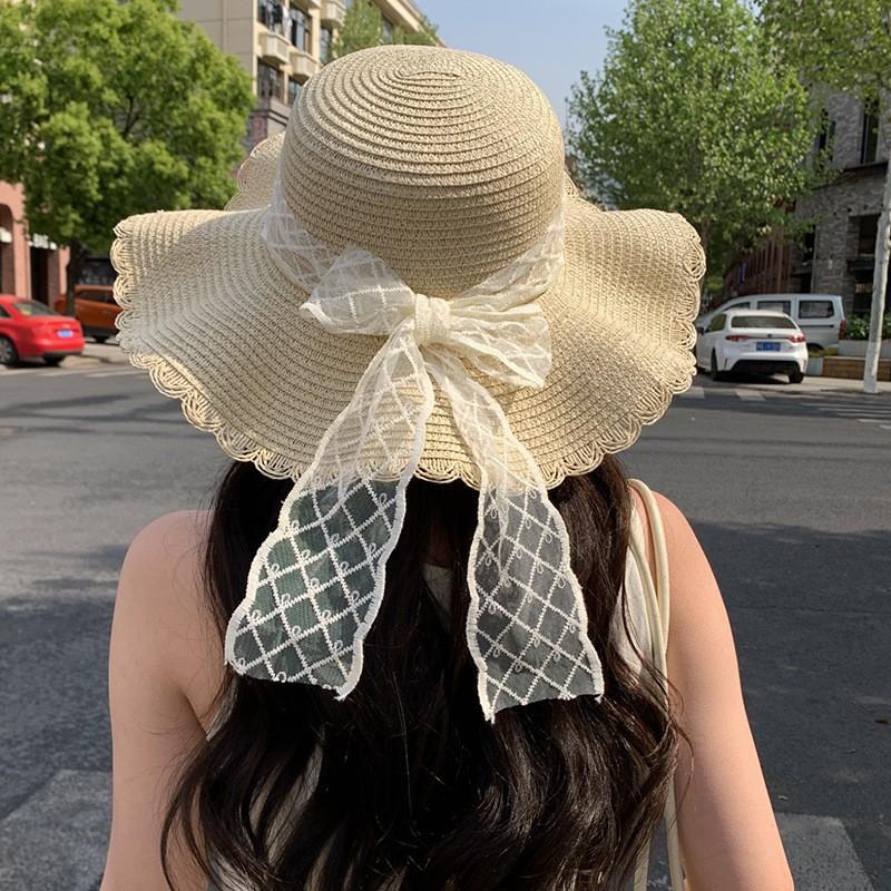 Straw hat female lace bow large brim foldable sunscreen visor seaside beach sweet bucket hat