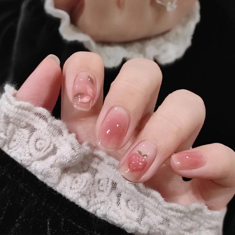 

Pink Girly Peach Camellia Short Press-On Nails with Cute Stickers Glue Kit