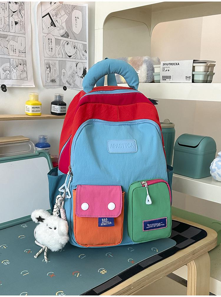 Schoolbag contrasting splicing Internet celebrity backpack female dopamine primary school bag Japanese large capacity burden reduction junior high