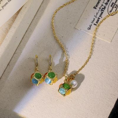 Douyin Bestseller: Cat's Eye Pendant Earrings & Dopamine Cube Necklace - Stylish, Unique, High-End Accessories.