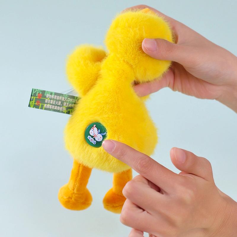 The new cute palm treasure, the little yellow duck doll doll, the car ornament accompanies the doll and gives children gifts.
