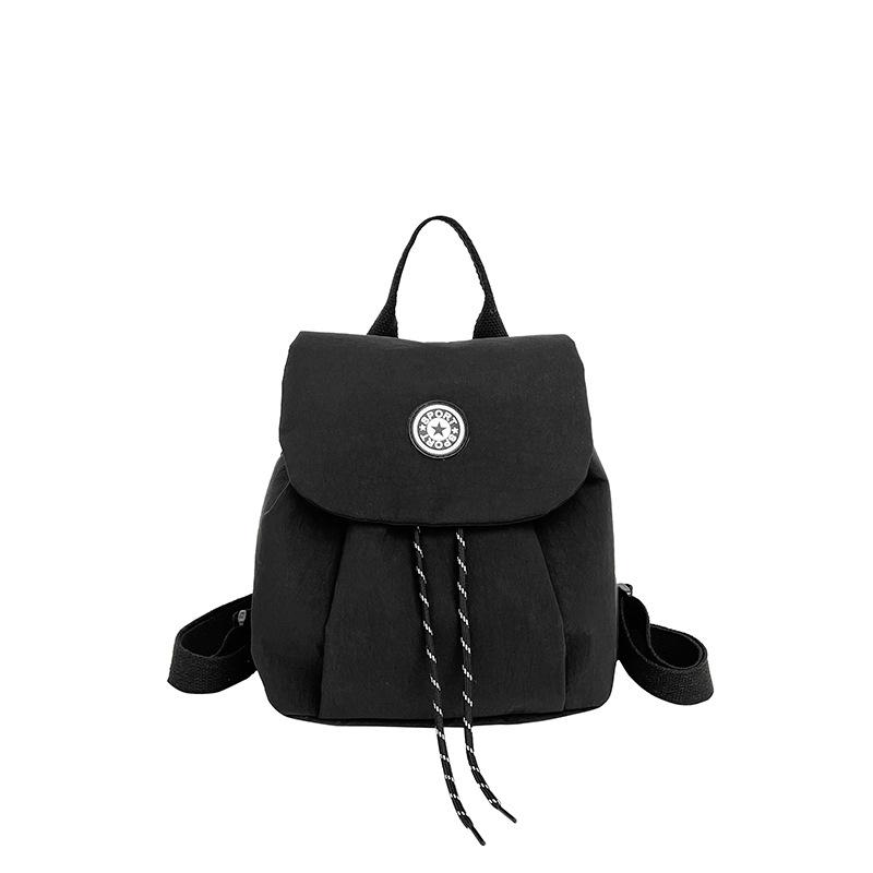 Korean version of simple nylon backpack, female student schoolbag, drawstring flip, versatile casual backpack, drawstring flip. чёрный