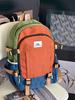 New contrasting color casual backpack large capacity personalized campus style junior high school student backpack