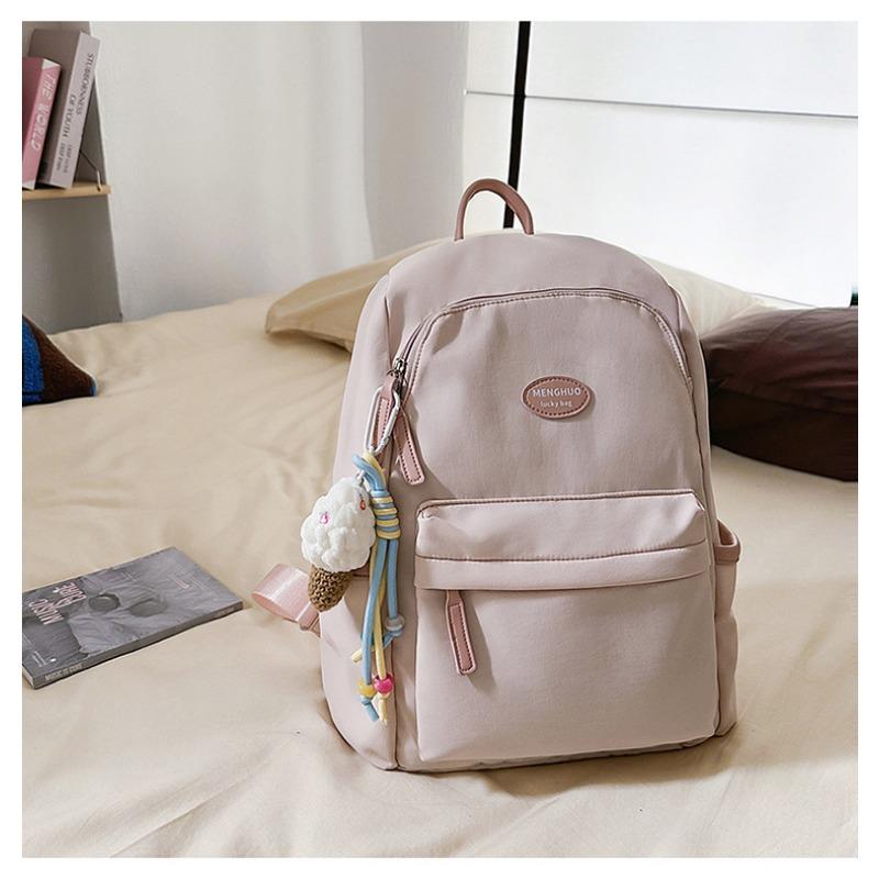 Fresh and sweet candy color backpack for junior high school students, solid color, simple and large-capacity backpack.