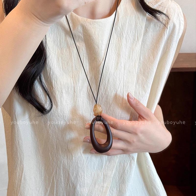 New Chinese-style Hollow Water Drop Long Necklace Women's Sweater Chain Simple Neck Accessories