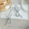 Light luxury exquisite high-end sense ribbon knot temperament earrings niche design sense fashion stud earrings sweet zircon earrings women
