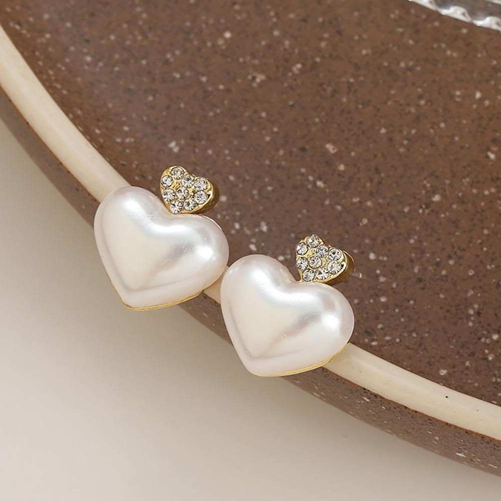 Temperament simple pearl love stud earrings women's light luxury niche design sense high sense Korean versatile earrings ear jewelry