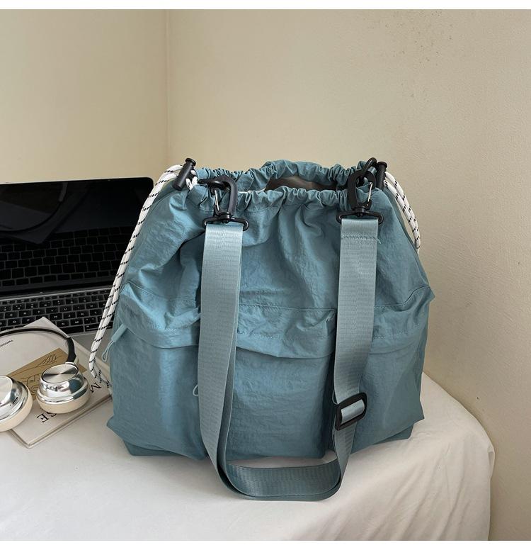 

Casual washed cloth shoulder bag women s 2025 new large-capacity lightweight tote bag Korean version single room messenger bag tide синий