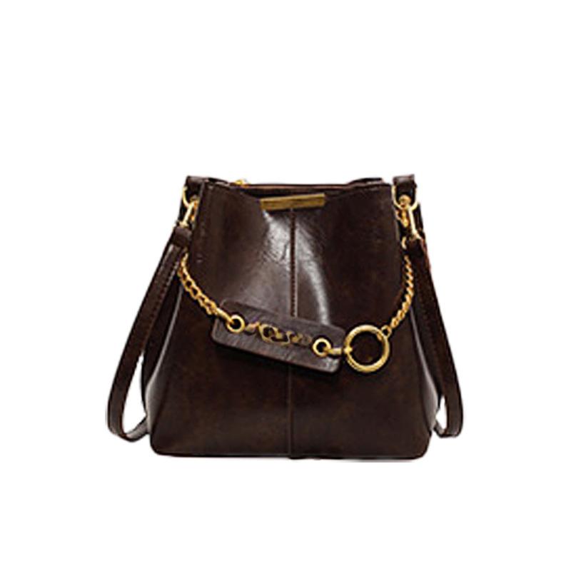 

Популярные сумки этого года Сумка-ведро Женская фактурная сумка через плечо Ретро-сумка через плечо для поездок на работу