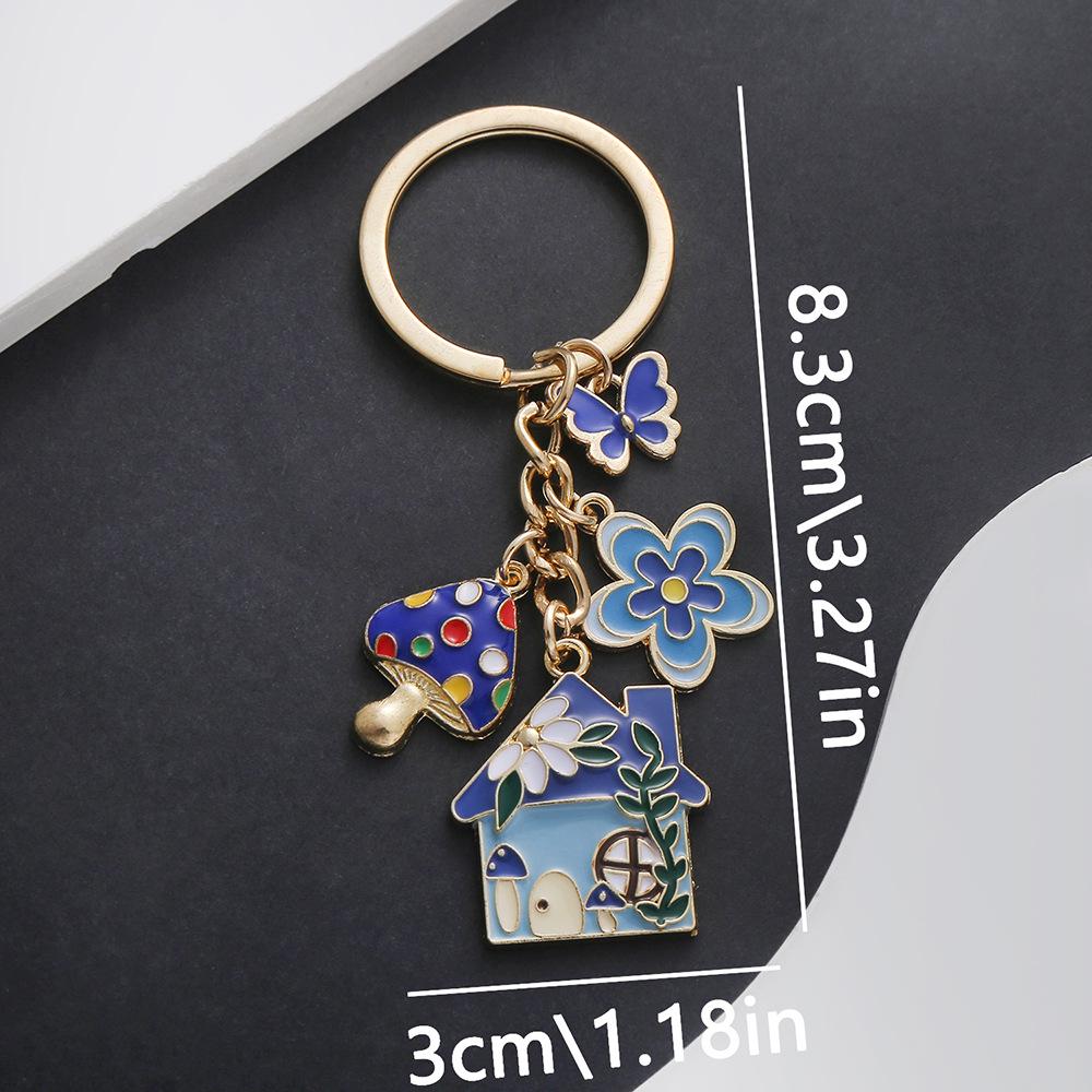 Creative Blue Flower Butterfly Mushroom House Keychain