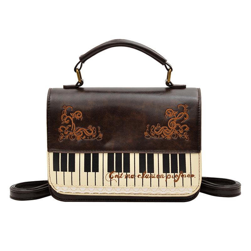 

Summer new fashion contrasting color small square bag girl sweet personality piano music note small satchel portable women s bag коричневий