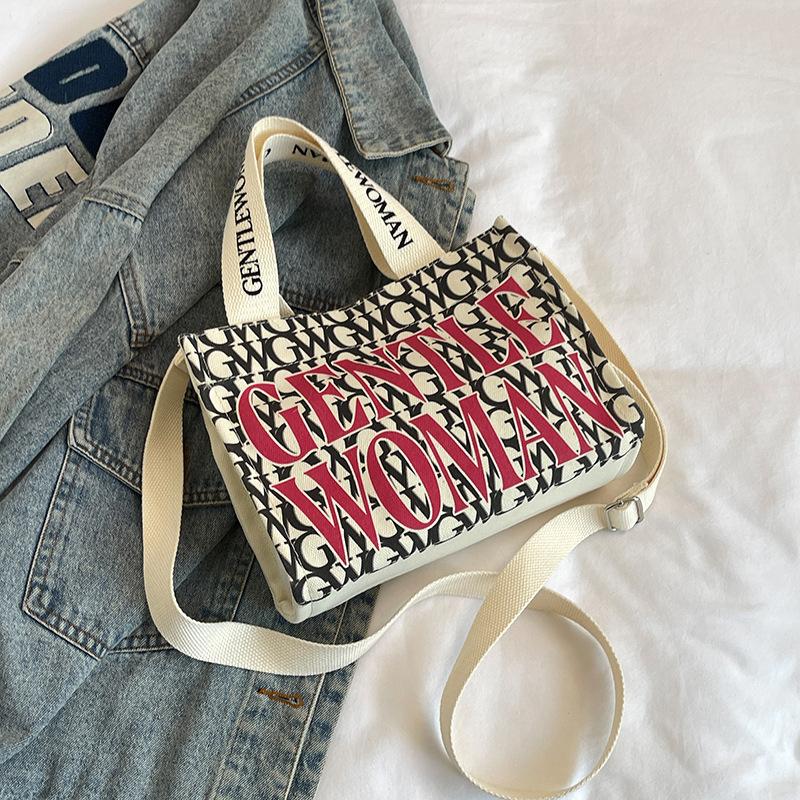 Fashion alphabet canvas shoulder bag 2025 new casual and beautiful foreign style messenger going out portable messenger small square bag