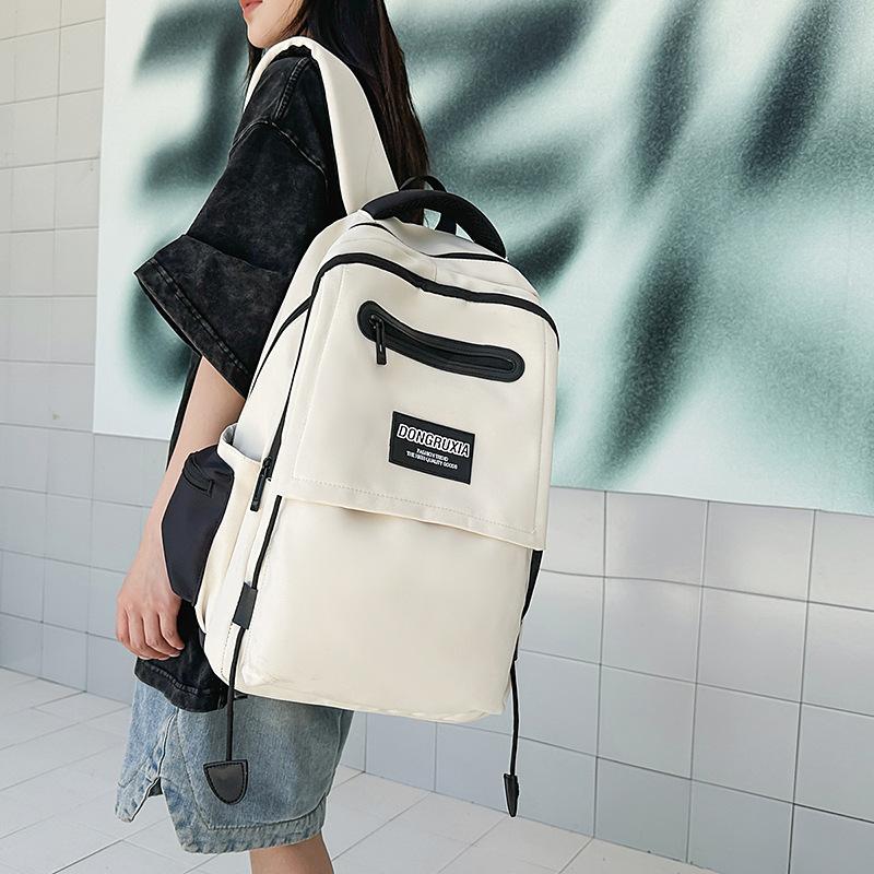 Backpack New large-capacity backpack Junior high school schoolbag College student backpack High value couple student schoolbag