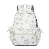 Schultasche neuer bedruckter Rucksack, frischer Studenten-Rucksack mit großem Fassungsvermögen und Entlastung für Frauen, blinkender Modetrend Fünfzackstern-Rucksack