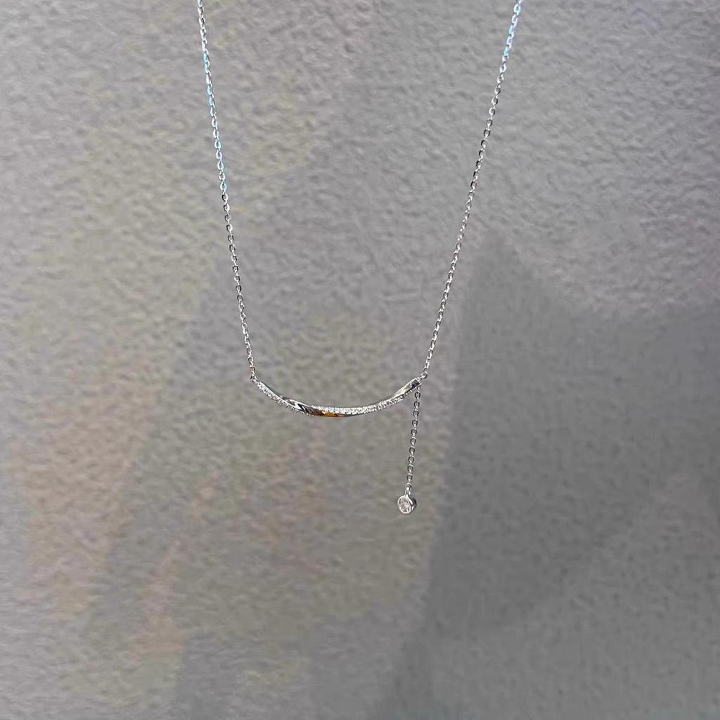 Zirconia Smile Tassel Water Drop Necklace: Summer Niche Design Clavicle Chain with Arc Smile Pendant.
