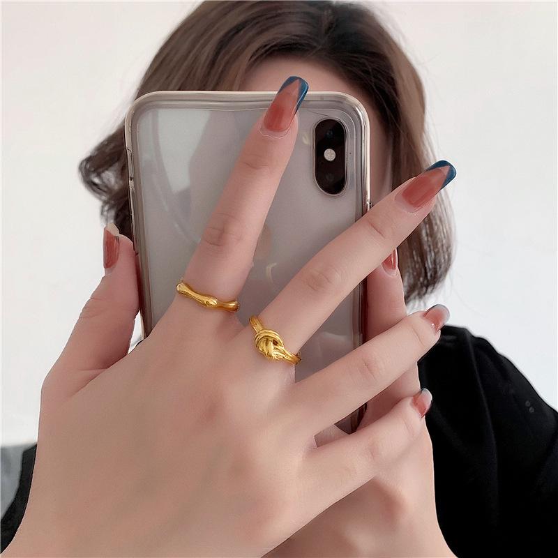 French Designer Titanium Steel Knotted Rope Ring for Women - Fashionable Simple Metal Jewelry
