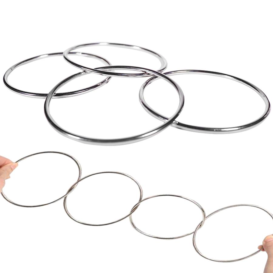 4 Stück/Set Magische Kraftringe Klassische Metall Runde Entschlüsselung Magie Bühne Straße Nahaufnahme Magie Familienfeier Aufführungsrequisiten