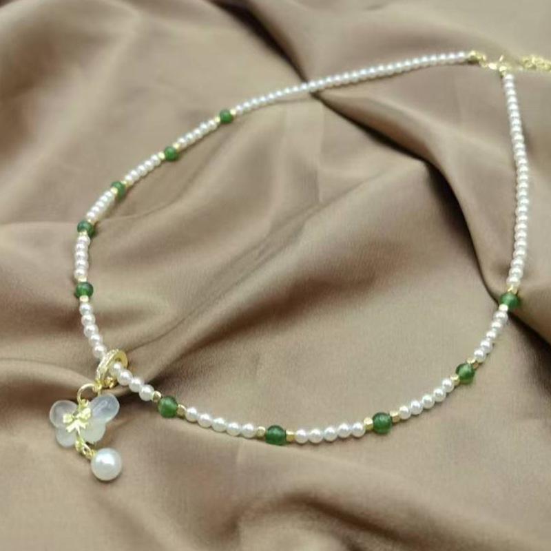 

Китайское ожерелье в национальном стиле с жемчугом-бабочкой и агатом белый