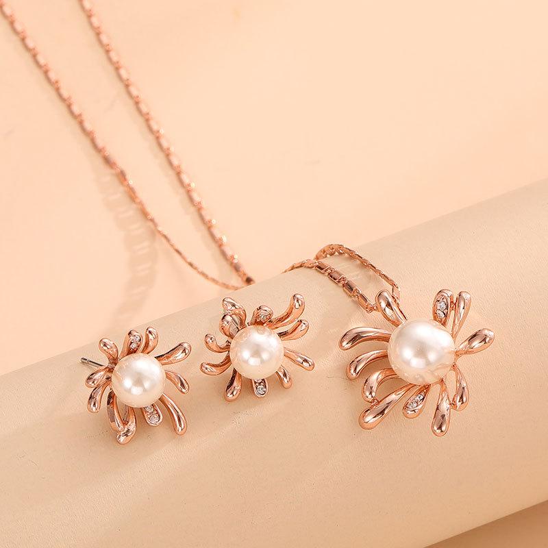 

Комплект ожерелья на ключицу и серег с жемчугом и подсолнухом для женщин