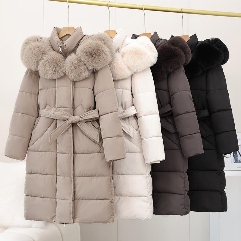 Dam Vinter Långa Kappor Med Huva Stor Fuskpäls Krage Elegant Tjock Varm Vinterparkas Kvinnlig Jacka Med Bälte