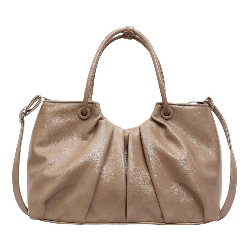 Korean version of foreign style niche design pleated handbag bag women's versatile foreign style advanced sense oil wax leather commuter messenger bag