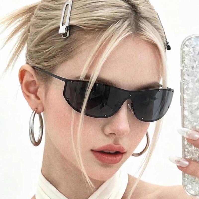 Edgy punk-style glasses, trendy oversized sunglasses, and stylish sun-blocking shades perfect for street style and travel.