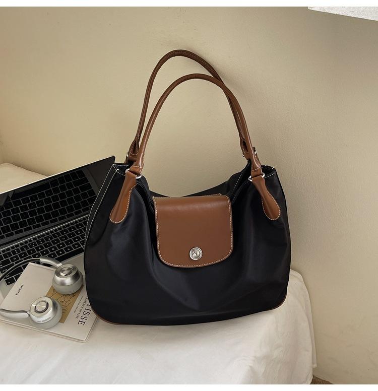

Casual large-capacity commuter bag women s 2025 new contrasting color splicing handbag bag nylon cloth shoulder tote bag tide коричневый