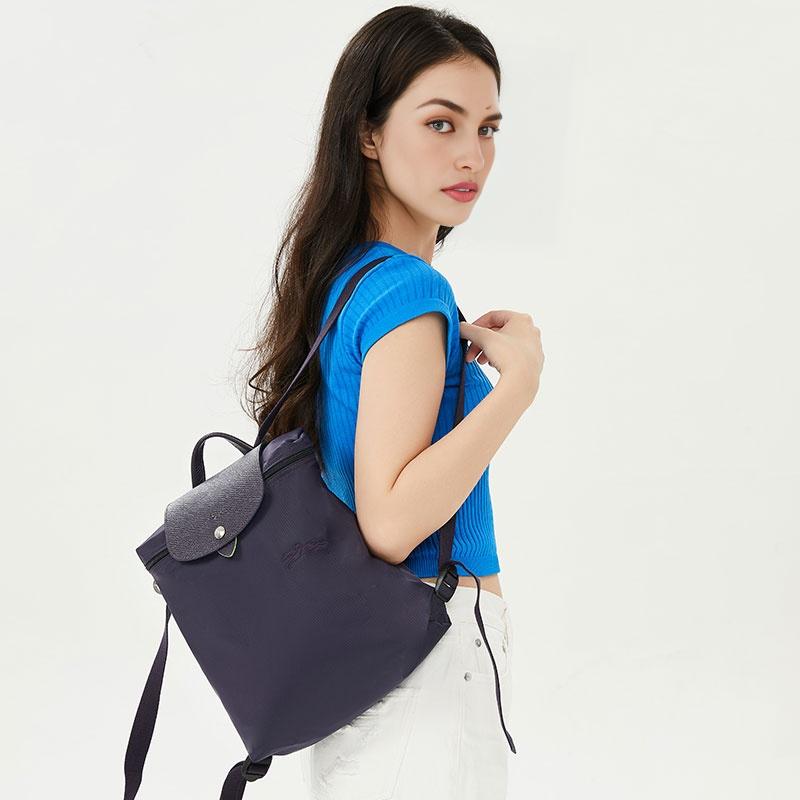 Longchamp Le Pliage Green Logo Druckknopf Reißverschluss Verstellbarer Schultergurt Recyceltes Polyamid Canvas Rucksack Damenrucksack Lila 1699919645